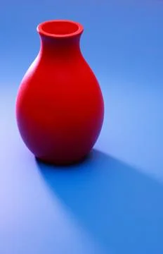 Red Vase On Blue Stock Photos
