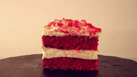 Red velvet cake scrolls around Stock Footage 120701769