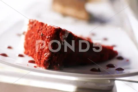 Red velvet cake slice on display Stock Photos