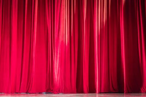 Red velvet curtains. Stock Photos