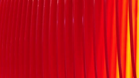 Red vertical elements creating an abstract pattern with a gradient light on the Video stock 322028237