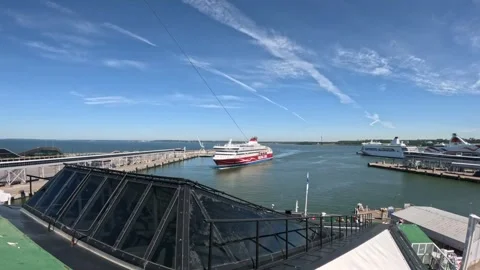 Red Viking Line passenger ferry navigating inside Port of Tallinn harbor Stock Footage 340329607