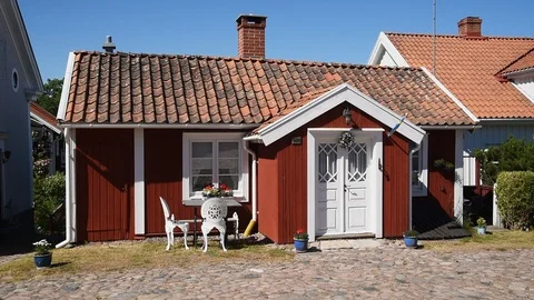 Red village cottage Stock Footage 94367488