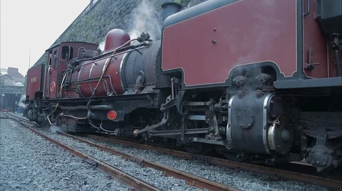 Red Vintage steam Train Engine in the station Stock Footage 128362226