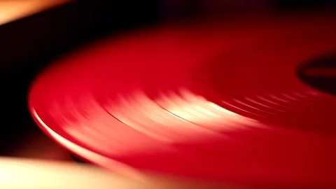 A Red Vinyl disc is spinning 2 Stock Footage 103205109