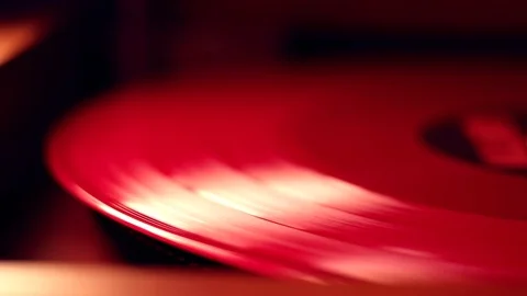 A Red Vinyl disc is spinning Stock Footage 103205103