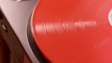 Red Vinyl Spinning in Record Player Stock Footage 219439190