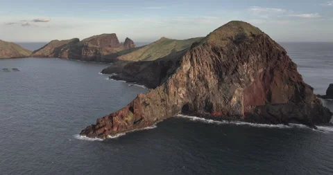 Red volcanic headland of Ponta de São Lourenço Madeira at sunrise Stock Footage 346610476