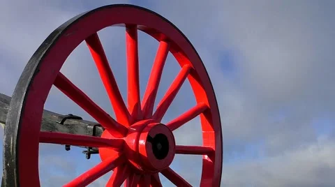 Red wagon wheel &amp; clouds (time lapse) Stock Footage 45904949