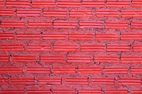 Red wall from bricks for background. Stock Photos