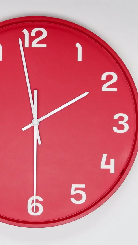A Red Wall Clock With The Time Of 2.00 Am Or Pm. A White Hands Of The Clock, The Video stock 266725639