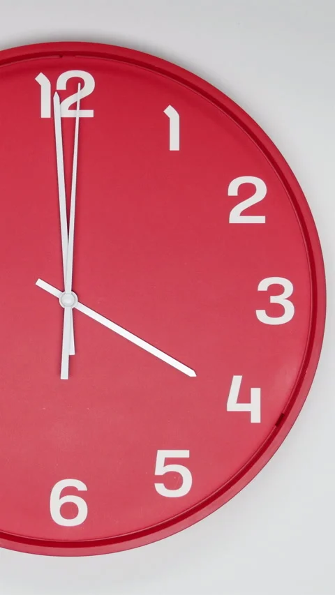 A Red Wall Clock With The Time Of 4.00 Am Or Pm. A White Hands Of The Clock, The Stock Footage 266741244