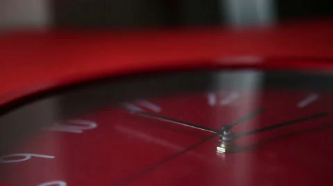 Red wall clock working and rewinding in a minute Stock-Footage 57846688