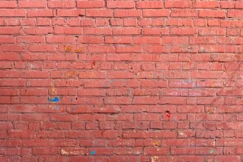 Red wall of painted brick Stock Photos