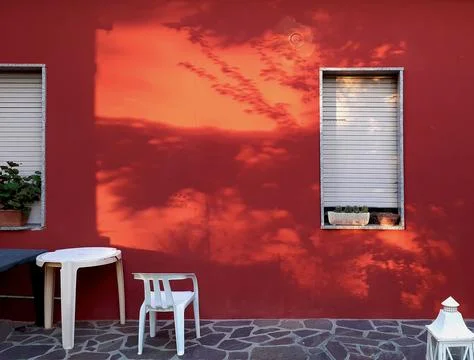 Red wall table window Stock Photos