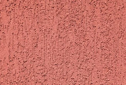 Red wall, texture, background. Plastered building wall. Decorated surface Stock Photos