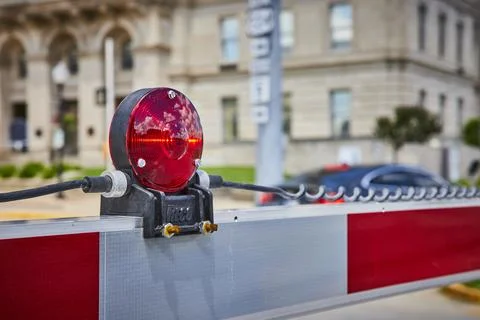 Red Warning Light and Security Barrier at Courthouse Entrance Eye-Level View Fotos Stock