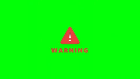 Red warning symbol on vibrant green background. Stock Footage 345067598