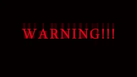 Red warning text flashing repeatedly on a dark screen with cinematic motion.. Stock Footage 343413476