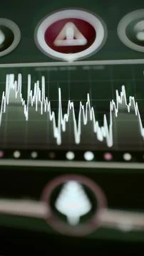 Red warning triangle above jagged market trace Stock Illustration