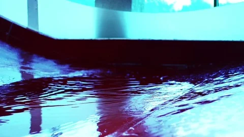 Red water slides and pool in aqua park. Video stock 78500658
