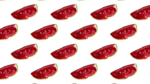 Red watermelon placed in a repeating pattern on a white background Stock Footage 341977139