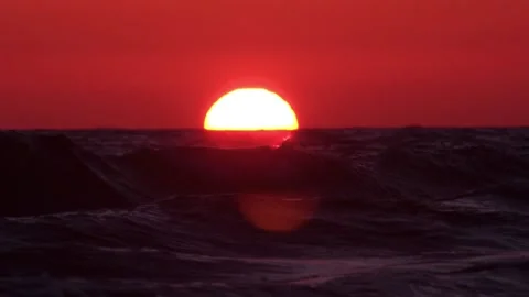 Red waves in the setting sun Stock Footage 169343328