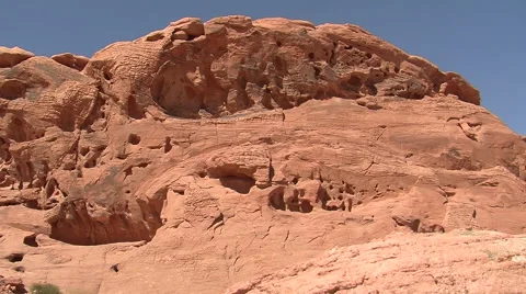 Red wavy rocks of Valley of Fire State park, NE Stockbeeldmateriaal 60013394