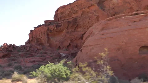 Red wavy rocks of Valley of Fire State park, NE in bright sunny day Stockbeeldmateriaal 60016553