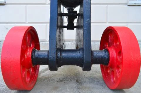Red wheels of a cannon Stock Photos