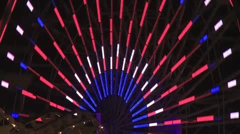 Red, White and Blue Lights On A Ferris Wheel 스톡 동영상 19098914