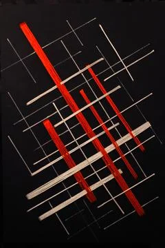 Red white and gray linear abstract on black Stock Photos
