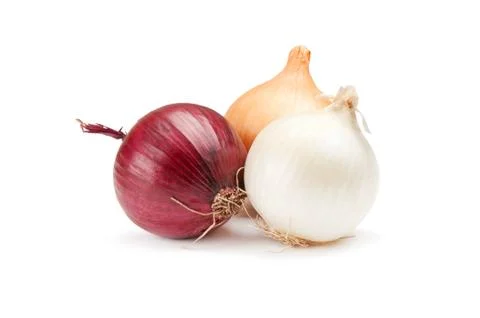 Red, white and yellow onions on a white background Stock Photos
