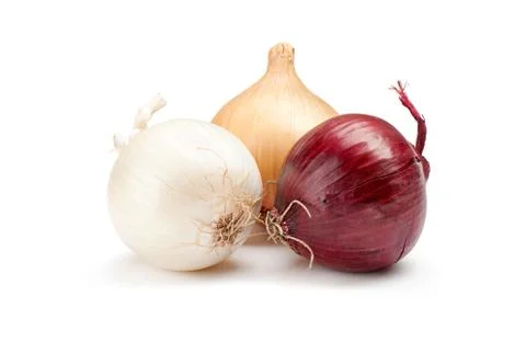 Red, white and yellow onions on a white background Stock Photos