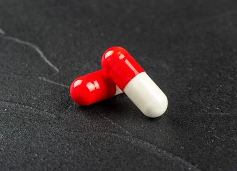 Red white capsules Stock Photos