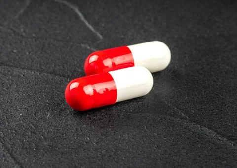 Red white capsules Stock Photos