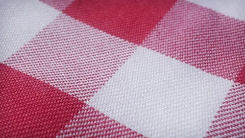 Red &amp; white checkered pattern table cloth extreme close up stock footage Stock Footage 90446434