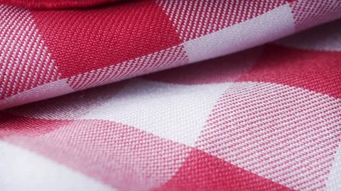 Red &amp; white checkered pattern table cloth extreme close up stock footage Stock Footage 90447597