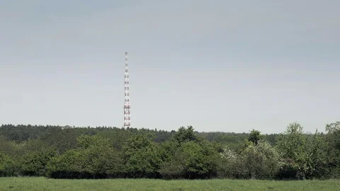 Red-white communications tower Видео 93804430