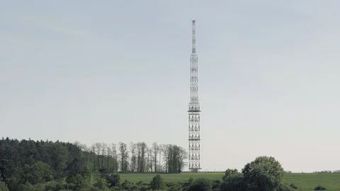 Red-white communications tower Видео 94023984