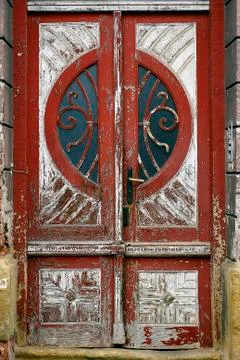 Red-white historic wooden door Stock Photos
