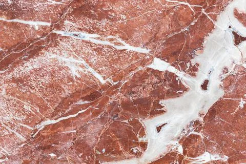 Red white marble pattern. Close-up photo texture. Natural stone Stock Photos