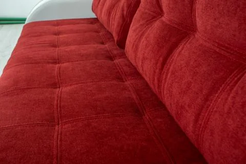 Red-white sofa texture close-up, couch Stock Photos
