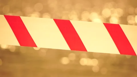 Red white warning tape barrier ribbon sw... | Stock Video | Pond5