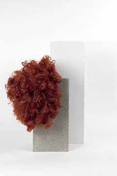 Red wig cinder block Stock Photos
