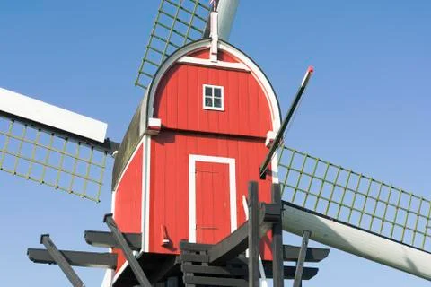 Red wind mill Stock Photos