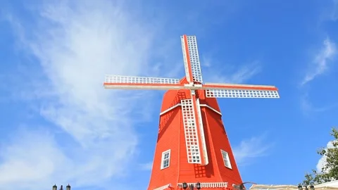 Red windmill against the blue sky in Kemer Stock Footage 91706657