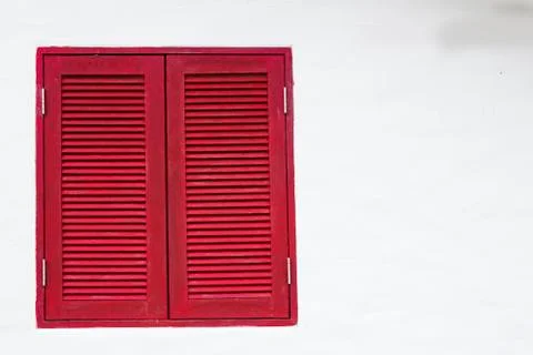 The Red window on white wall Stock Photos