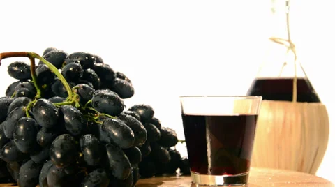 Red wine and grapes Видео 32345308