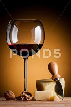 Red wine and hard cheese Stock Photos